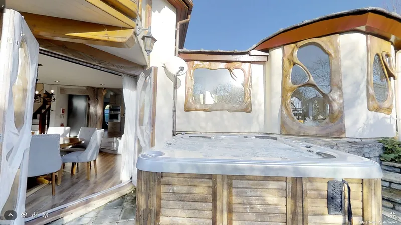 The private hot tub beside the pod