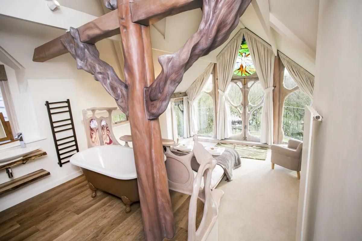 The tree growing through Hunter's Moon beside the freestanding bath in the master suite
