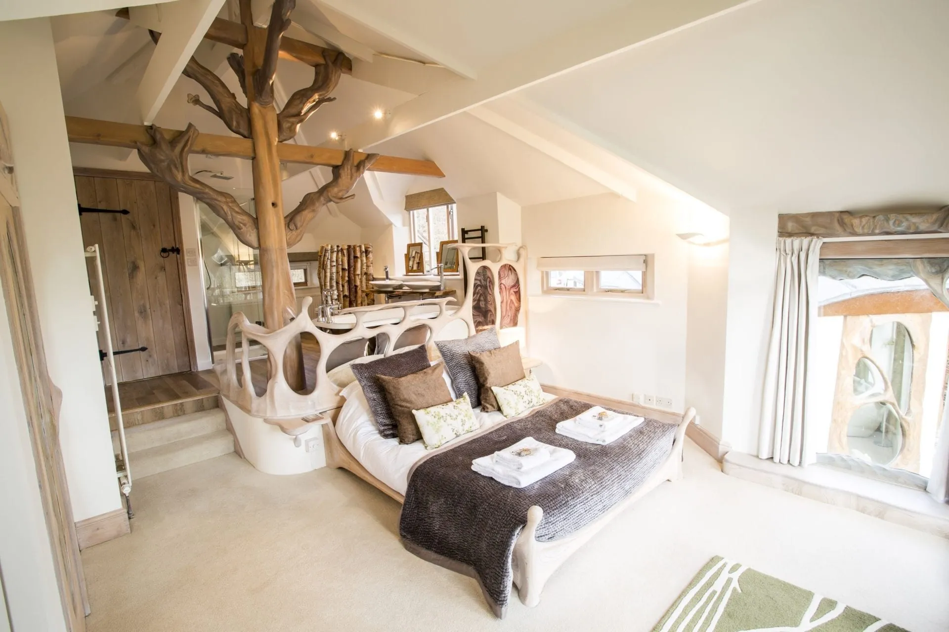 Master bedroom at Hunter's Moon with the tree growing through the house